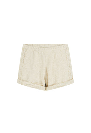 cream-colored-knit-shorts-with-a-ribbed-waistband-and-hem-displayed-flat-against-a-white-background